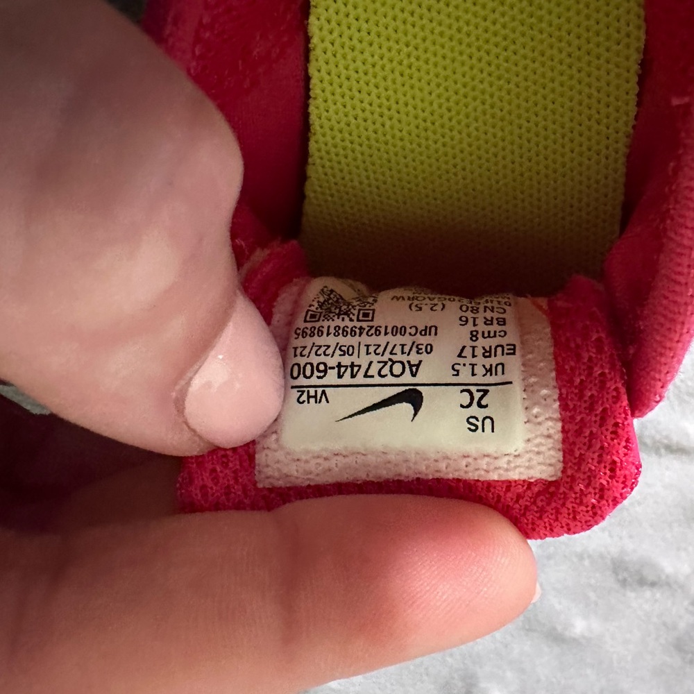 Like new baby girl hot pink Nike shoes size 2C